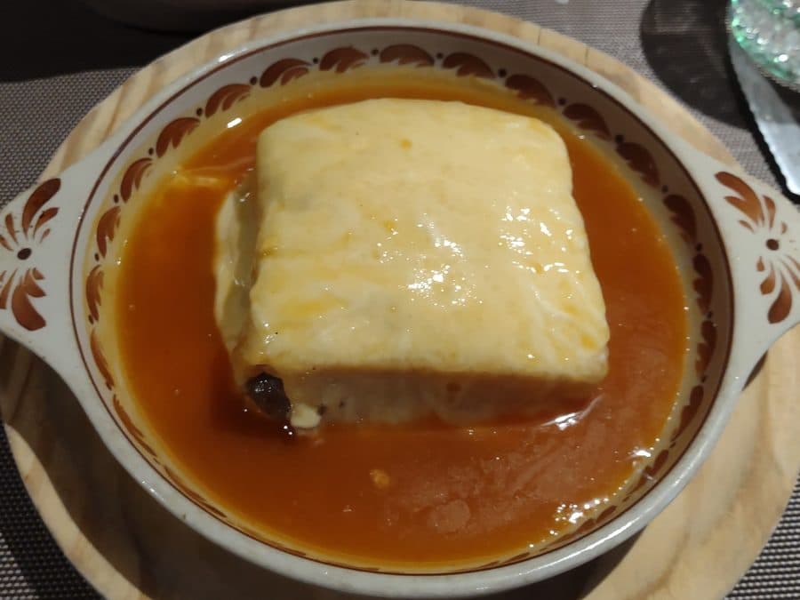 A francesinha, the Porto sandwich under melted cheese